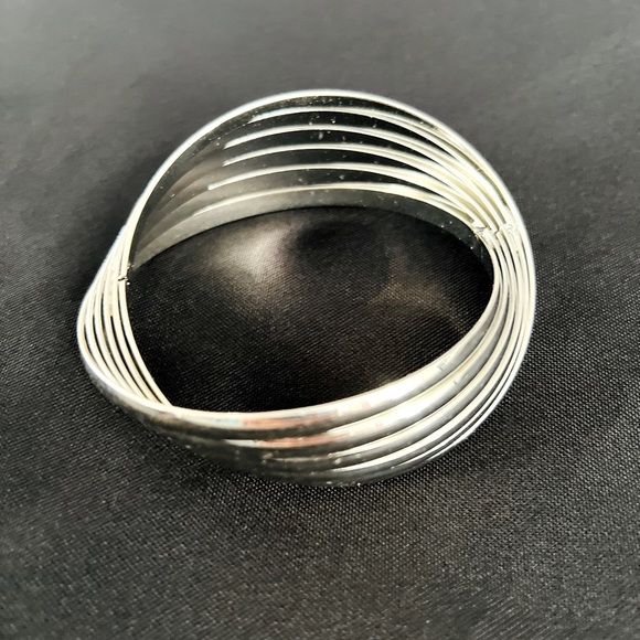 Silver-toned metal super unique and stylish bracelet. - Picture 2 of 4